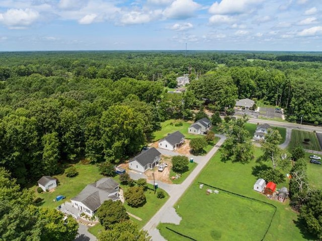 drone / aerial view with a view of trees