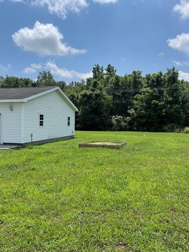 91 Dameron Dr, Hague, VA 22469 - view of green lawn featuring an outbuilding