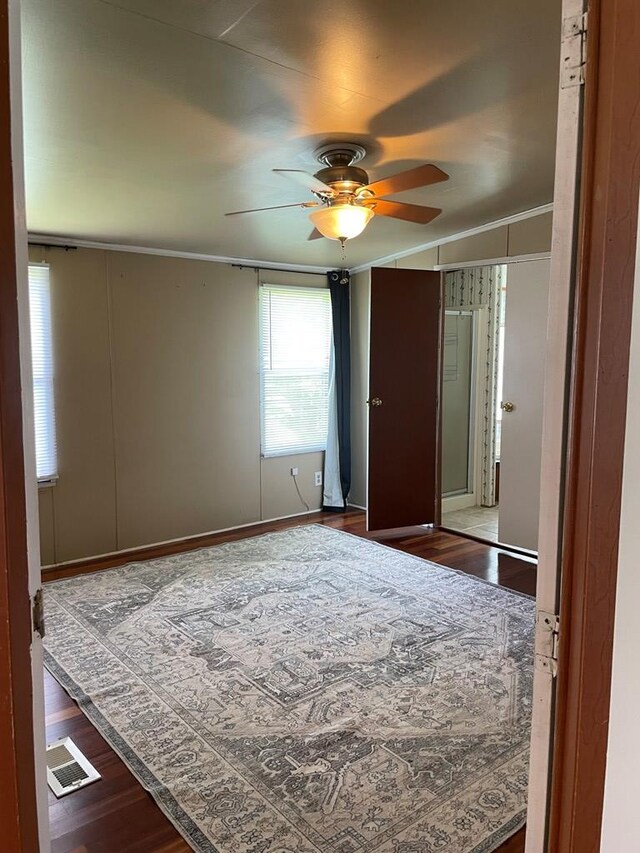 91 Dameron Dr, Hague, VA 22469 - unfurnished room with a ceiling fan, wood finished floors, and ornamental molding