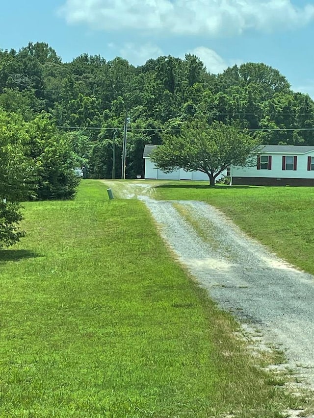 91 Dameron Dr, Hague, VA 22469 - view of community featuring driveway and a yard