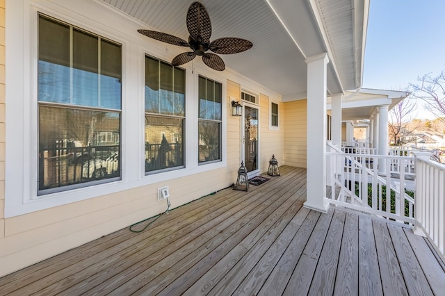 wooden deck with ceiling fan