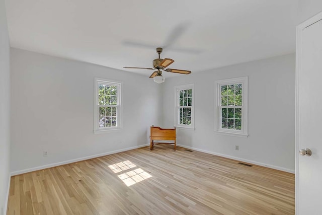 94 Arcadia Dr, Newport News, VA 23608 - unfurnished room featuring plenty of natural light, light wood finished floors, and ceiling fan