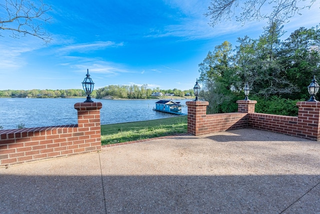 exterior space with a water view