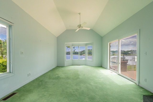 interior space featuring ceiling fan and vaulted ceiling