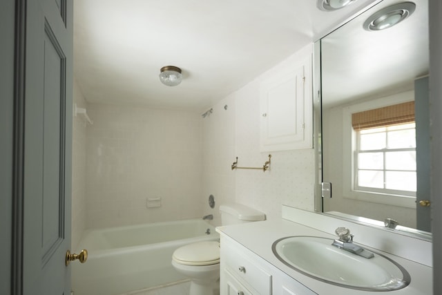 full bathroom with vanity, toilet, and shower / washtub combination