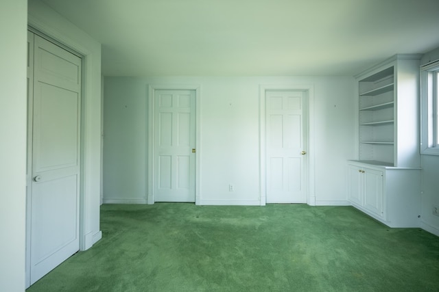 unfurnished bedroom with light carpet