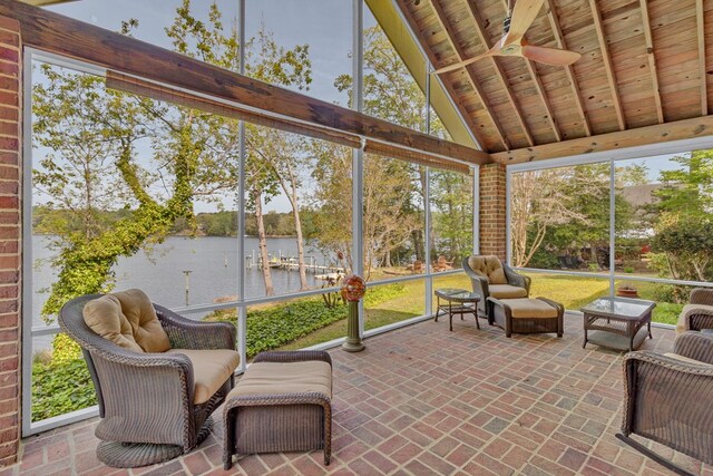555 Rio Vis, Weems, VA 22576 - sunroom / solarium featuring beamed ceiling, ceiling fan, and a water view