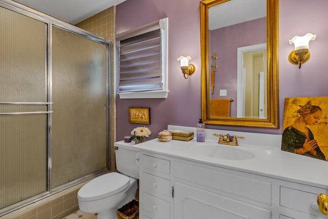 555 Rio Vis, Weems, VA 22576 - bathroom with a shower with shower door, vanity, and toilet