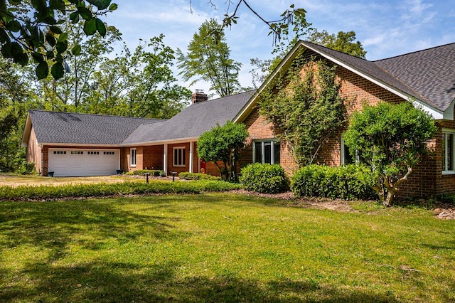 555 Rio Vis, Weems, VA 22576 - ranch-style home featuring brick siding, a front yard, and an attached garage