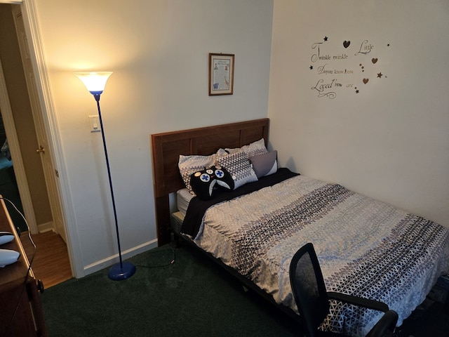 bedroom featuring carpet