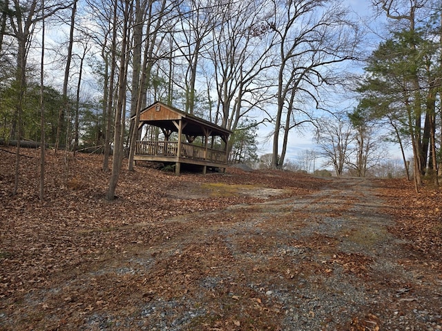 view of yard featuring a wooden deck