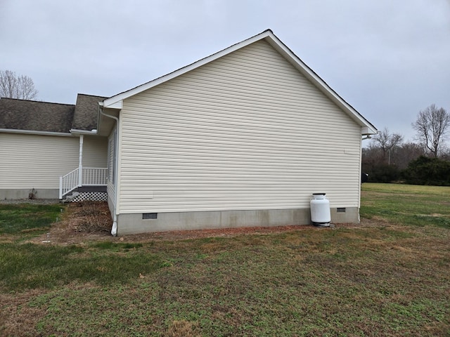 view of property exterior with a lawn