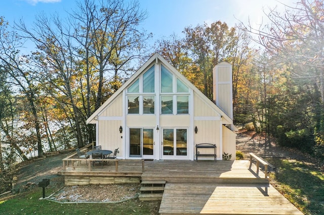 rear view of property with a deck