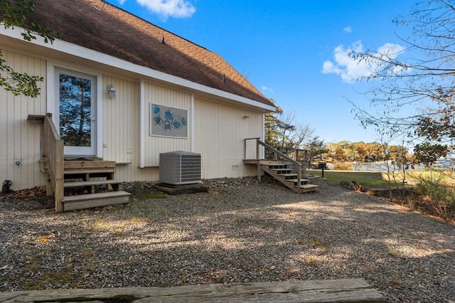 exterior space featuring central AC unit