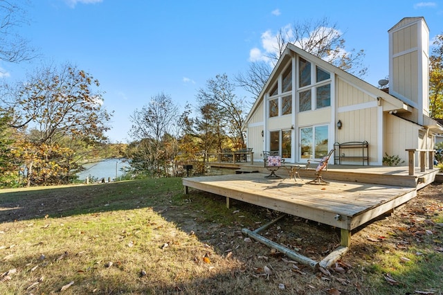 exterior space featuring a lawn and a deck