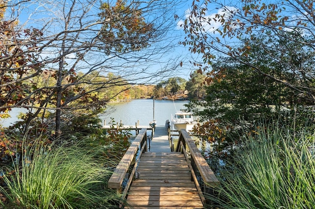 view of dock with a water view