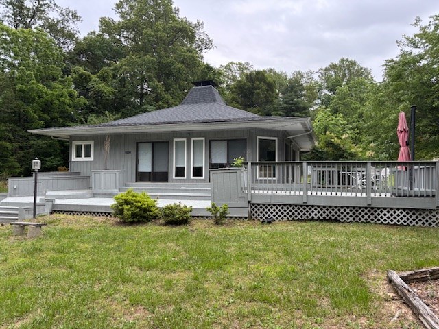890 Gordon Way, Montross, VA 22520 - back of property featuring a wooden deck, a yard, and a chimney