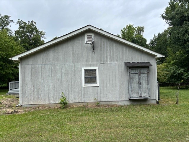 890 Gordon Way, Montross, VA 22520 - view of home's exterior featuring a yard