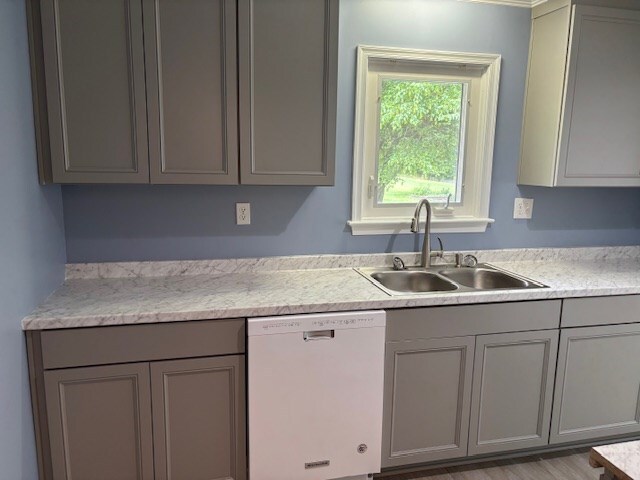 890 Gordon Way, Montross, VA 22520 - kitchen with dishwasher, gray cabinetry, a sink, and light countertops