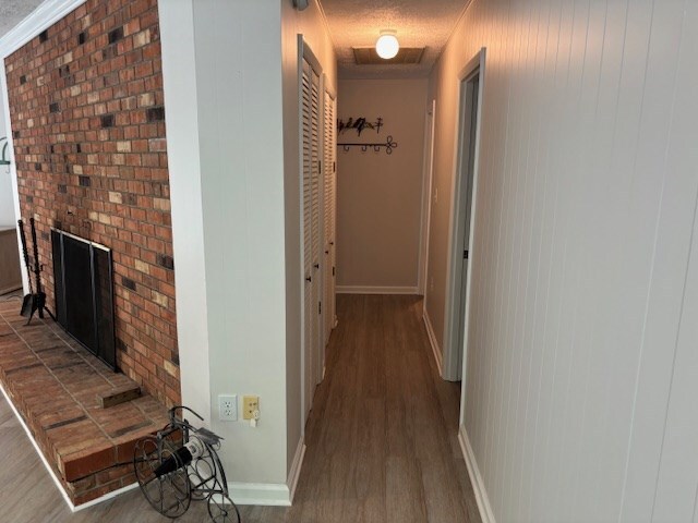 890 Gordon Way, Montross, VA 22520 - hallway featuring wood finished floors and baseboards