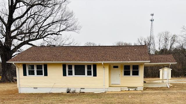 view of front of home featuring crawl space