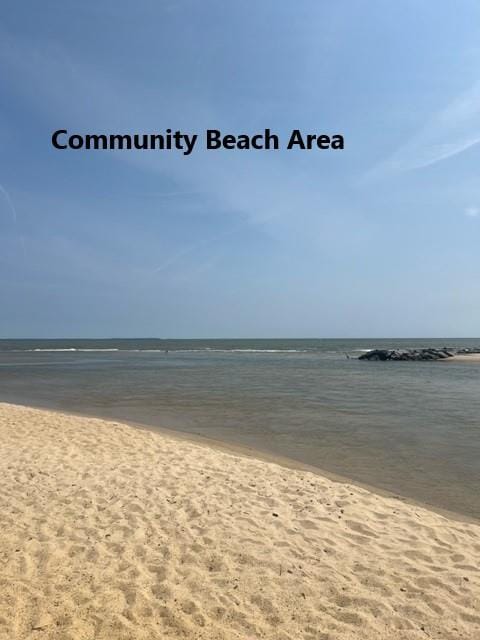 property view of water with a beach view