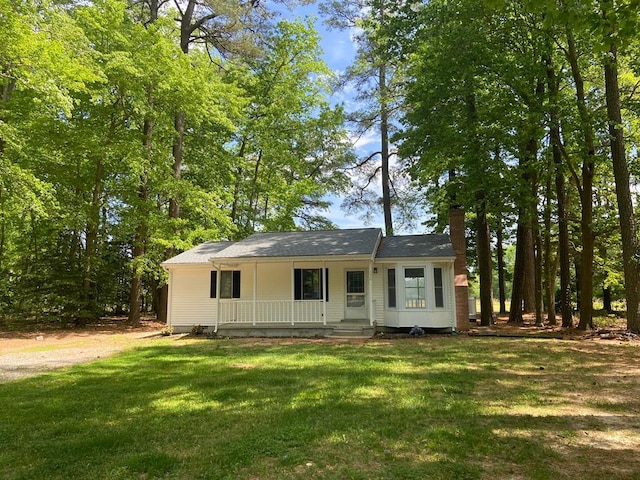 view of front of home featuring a porch and a front yard