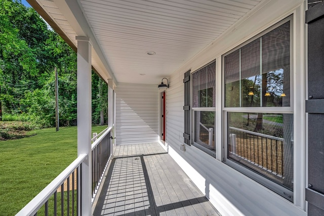 405 Cedar Ln, Colonial Beach, VA 22443 - wooden porch featuring a lawn