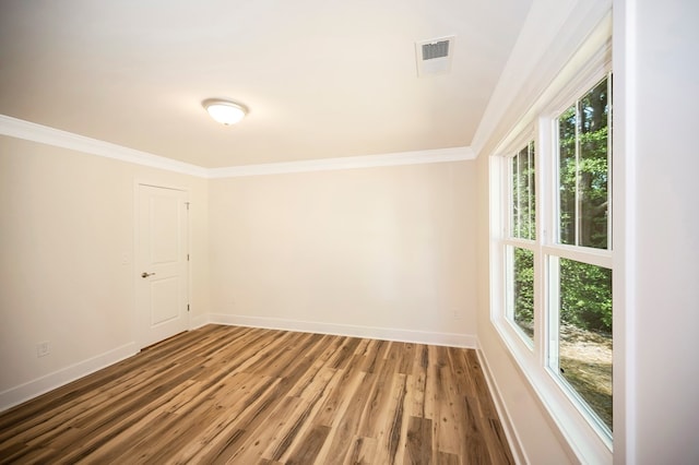 405 Cedar Ln, Colonial Beach, VA 22443 - unfurnished room featuring wood finished floors and ornamental molding