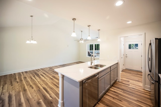 405 Cedar Ln, Colonial Beach, VA 22443 - kitchen featuring stainless steel appliances, wood finished floors, a ceiling fan, gray cabinets, and recessed lighting