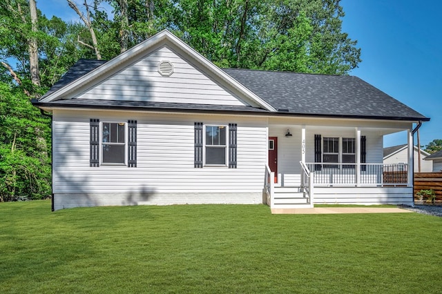 405 Cedar Ln, Colonial Beach, VA 22443 - view of front of property with a front yard, a porch, and a shingled roof