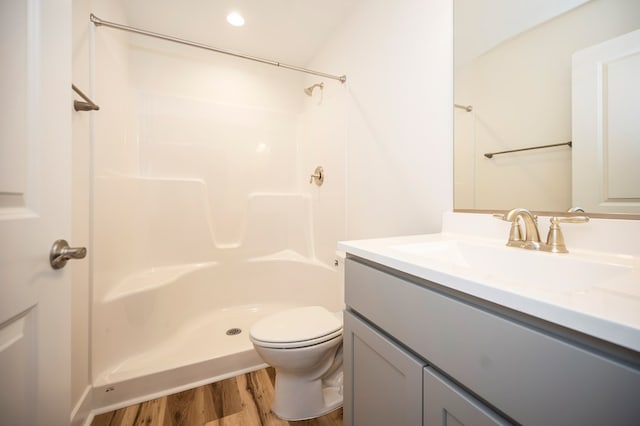 405 Cedar Ln, Colonial Beach, VA 22443 - bathroom featuring vanity, wood finished floors, and a shower