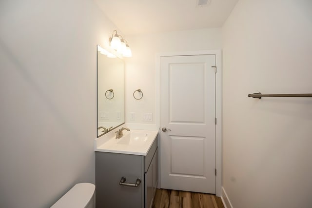 405 Cedar Ln, Colonial Beach, VA 22443 - bathroom featuring vanity and wood finished floors
