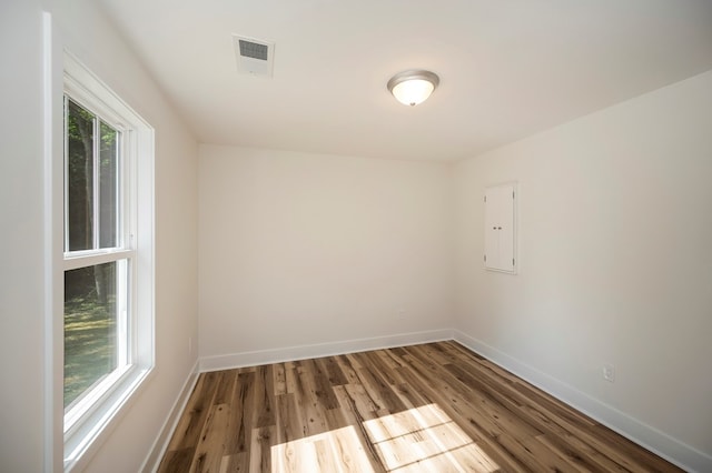 405 Cedar Ln, Colonial Beach, VA 22443 - empty room featuring wood finished floors and electric panel