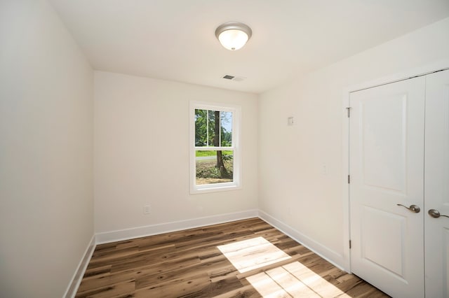 405 Cedar Ln, Colonial Beach, VA 22443 - empty room with wood finished floors and baseboards