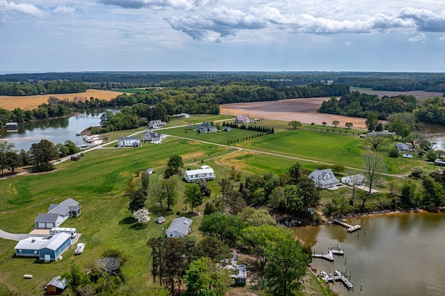 birds eye view of property featuring a water view and a rural view