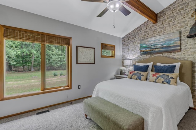 carpeted bedroom featuring vaulted ceiling with beams and ceiling fan