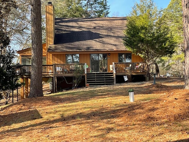 view of front of home featuring a wooden deck