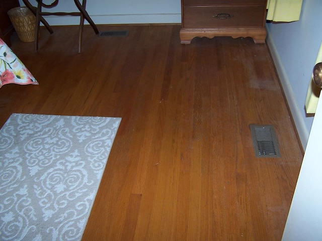 interior details featuring wood-type flooring