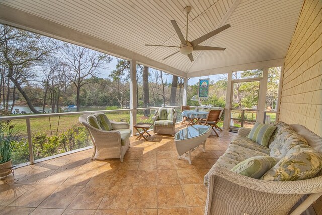 403 Moores Creek Dr, Deltaville, VA 23043 - sunroom / solarium featuring outdoor lounge area, ceiling fan, and view of scattered trees