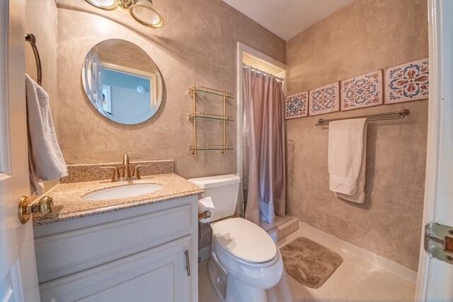 403 Moores Creek Dr, Deltaville, VA 23043 - bathroom featuring a shower with shower curtain, tile patterned flooring, vanity, and toilet