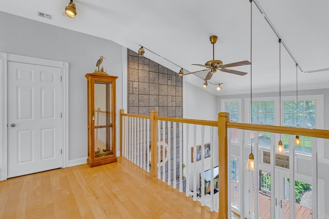 324 Bayberry Ln, Reedville, VA 22539 - hall with wood finished floors, vaulted ceiling, and baseboards
