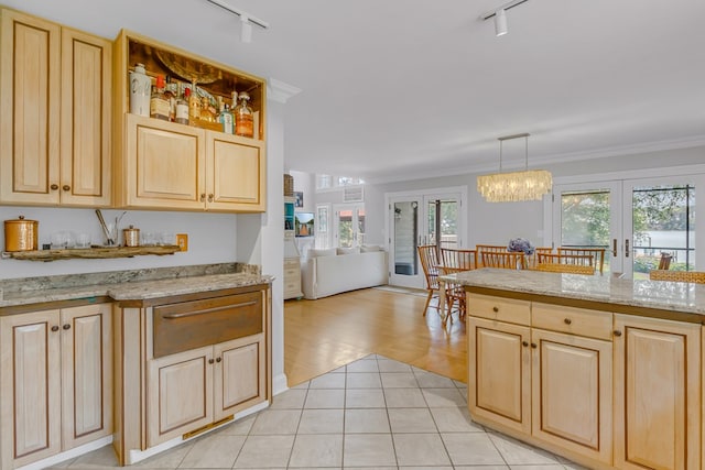 324 Bayberry Ln, Reedville, VA 22539 - kitchen featuring track lighting, french doors, light brown cabinetry, open floor plan, and crown molding