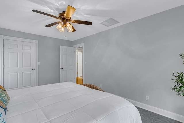 324 Bayberry Ln, Reedville, VA 22539 - bedroom with baseboards, a ceiling fan, and carpet floors