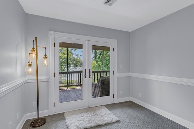 324 Bayberry Ln, Reedville, VA 22539 - doorway to outside featuring carpet flooring, french doors, and baseboards