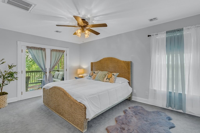 324 Bayberry Ln, Reedville, VA 22539 - carpeted bedroom featuring access to outside, baseboards, and ceiling fan