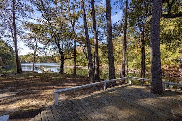 wooden deck with a water view