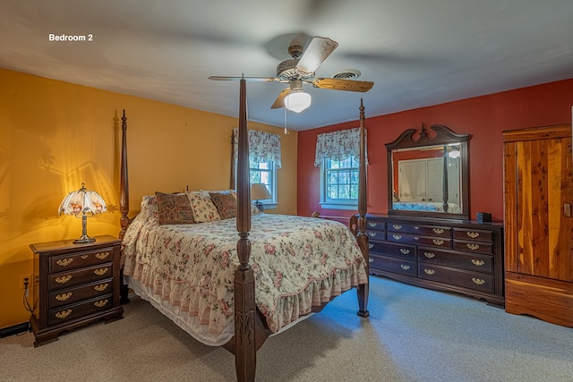 carpeted bedroom with ceiling fan