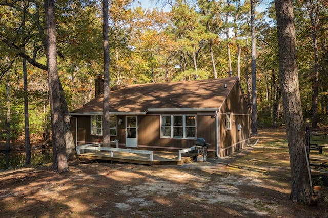 view of front of home with a wooden deck