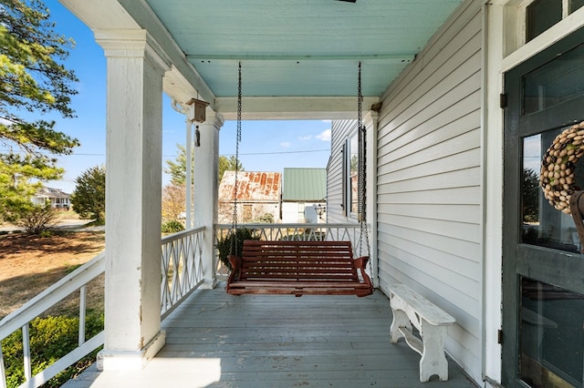 wooden terrace with covered porch